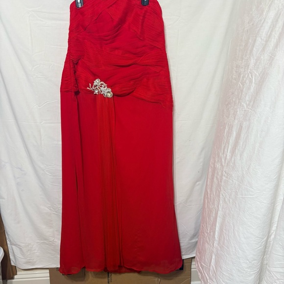 Red strapless gown is a Faviana style 7131 formal dress - Picture 2 of 9